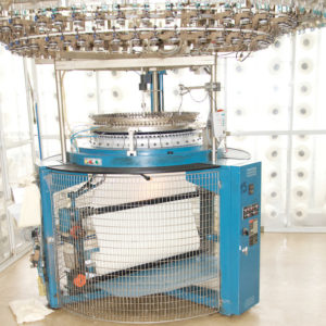 knitting machine for acoustic fabric 